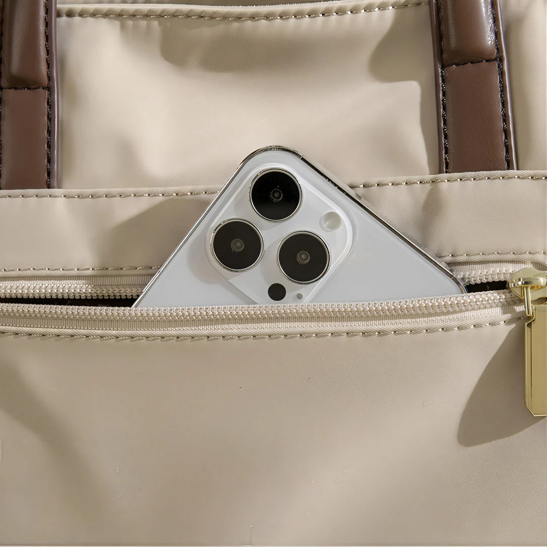 Sac de cours Velana beige avec téléphone dans la poche pour un style pratique