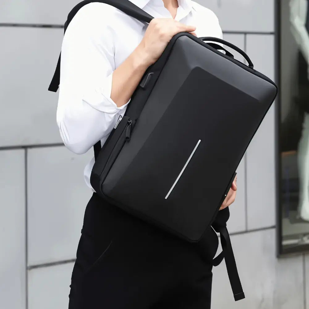 Petit sac à dos antivol noir avec cadenas TSA et ouverture à 180° pour une sécurité optimale