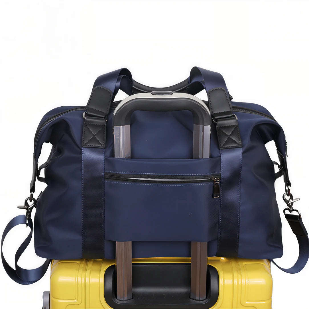 Petit sac de voyage Vectra avec sac de sport bleu sur valise jaune pour courts séjours