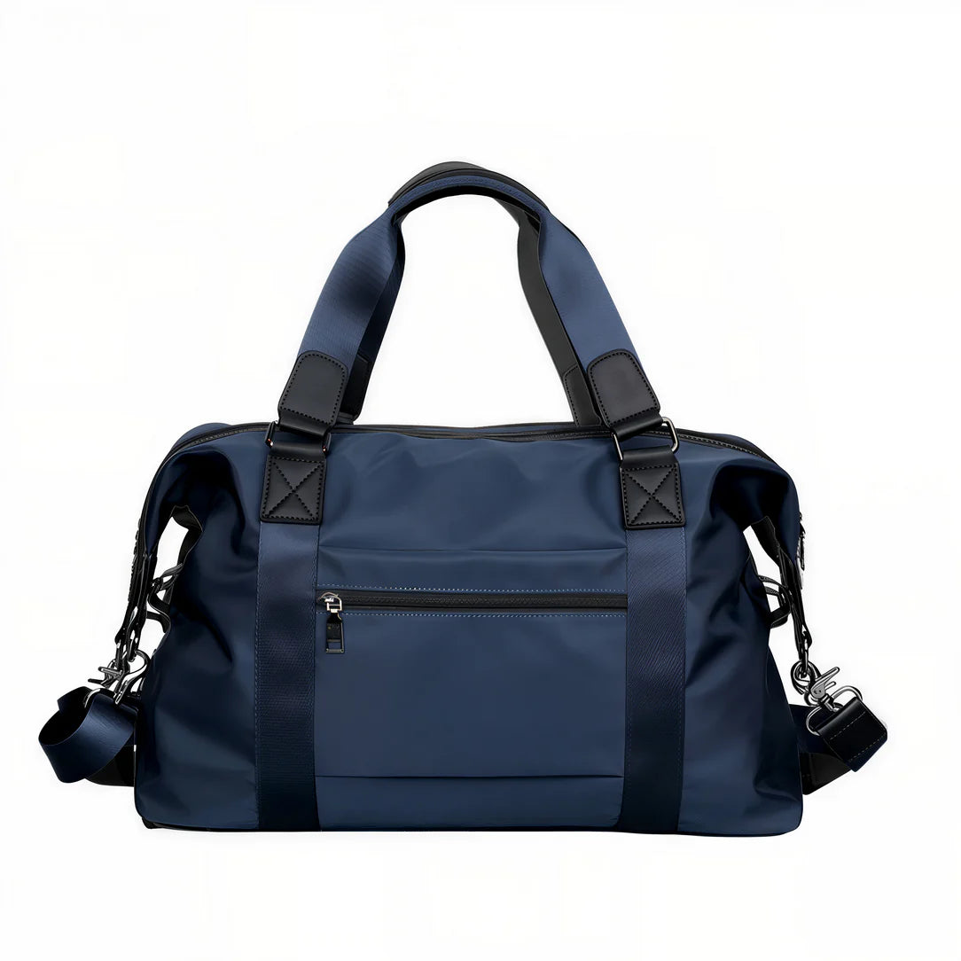 Sac de voyage Vectra bleu avec accents noirs, idéal pour petits sacs et courts séjours