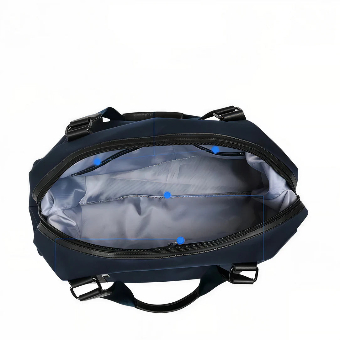 Petit sac de voyage Vectra en bleu marine ouvert, idéal pour courts séjours