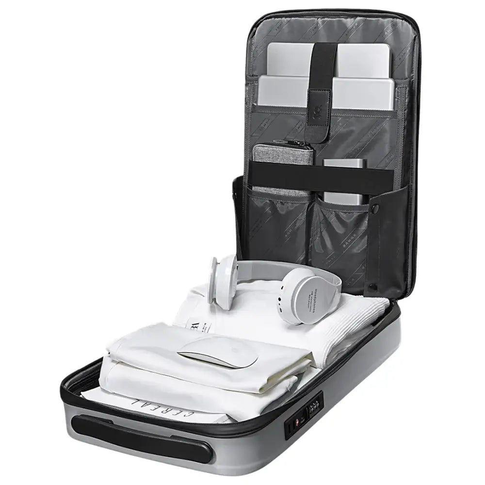 Valise gris ouverte avec électronique et vêtements, Sac à dos antivol SlimGuard avec cadenas tsa intégré