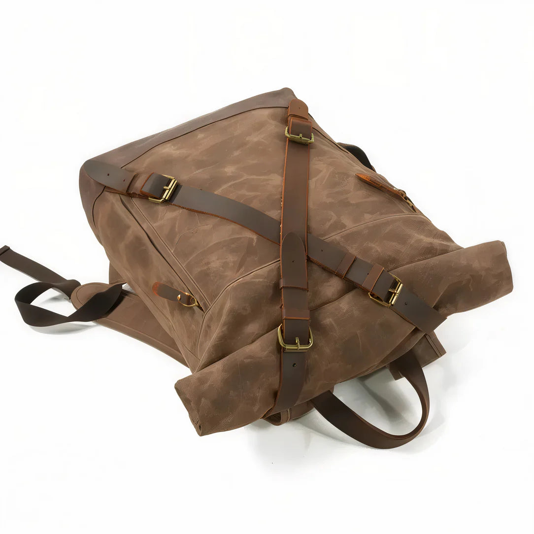 Sac à dos baroudeur Nomad en toile marron avec bretelles en cuir