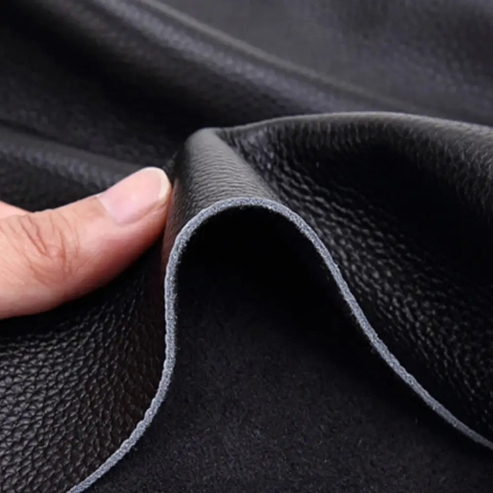 Texturé en cuir noir pour homme dans le sac à dos cuir noir Obscaro
