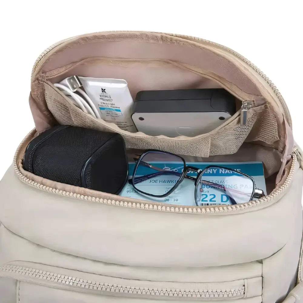 Sac à dos de voyage 40l beige ouvert pour AéroTrail