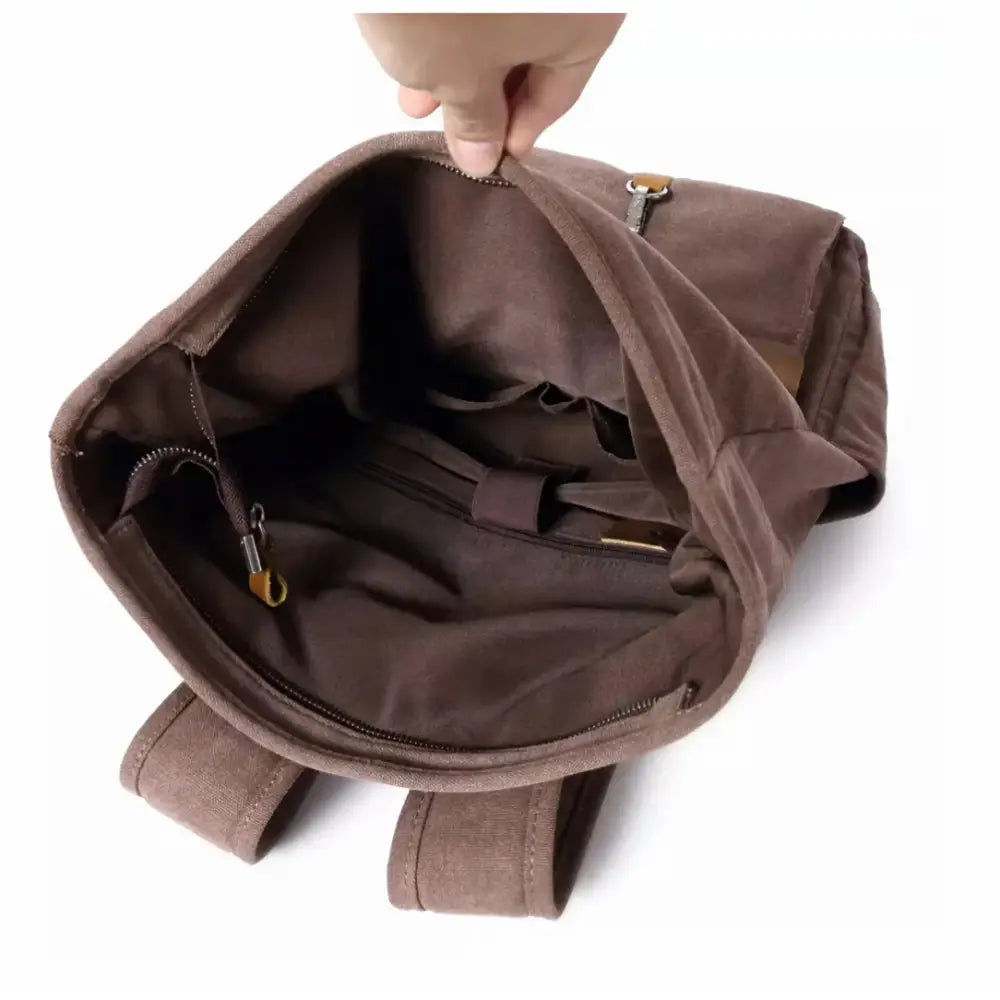 Sac à dos en toile vintage vue ouverte avec cuir pleine fleur pour un style authentique