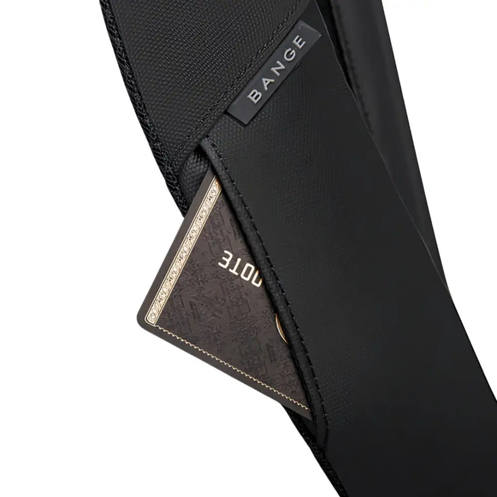 Sac noir avec une pochette contenant un carnet de notes.