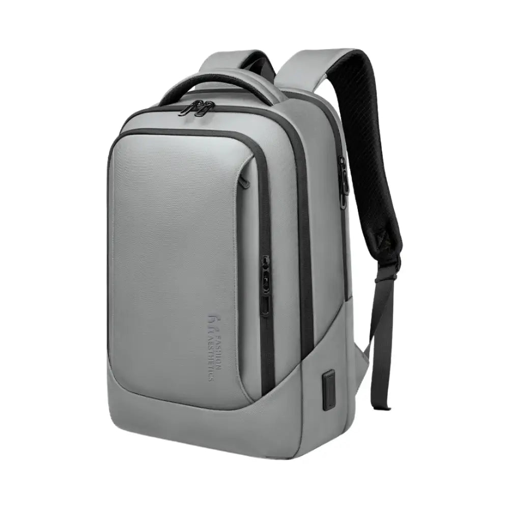 Sac à dos gris et moderne avec des accents noirs.