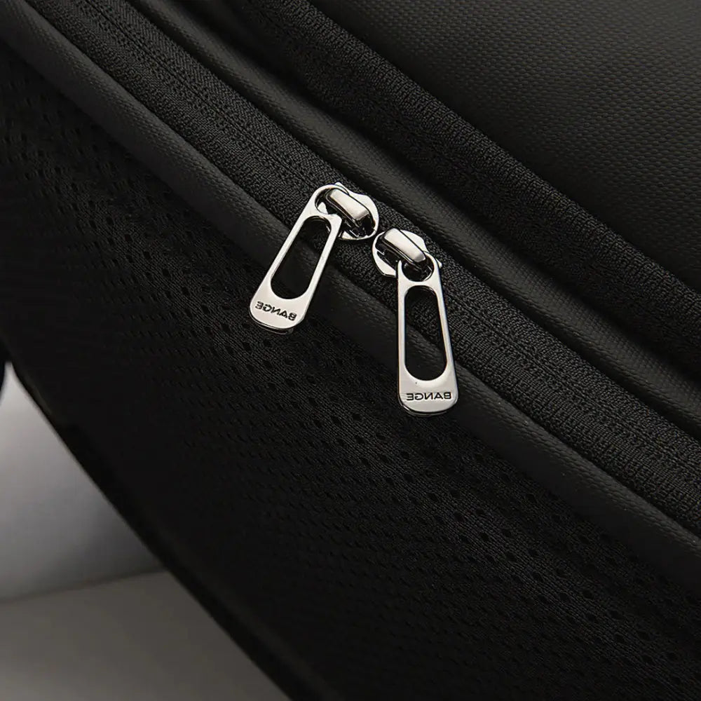 Sac à dos ordinateur femme imperméable avec tissu noir et fermetures éclair en argent