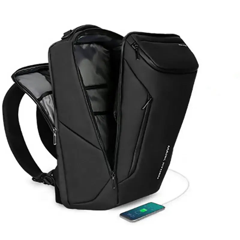Sac à dos noir ouvert avec téléphone à charger.
