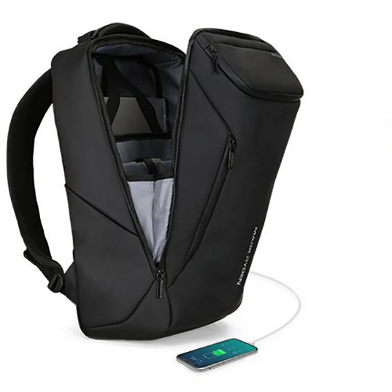 Sac à dos noir ouvert avec téléphone à charger.