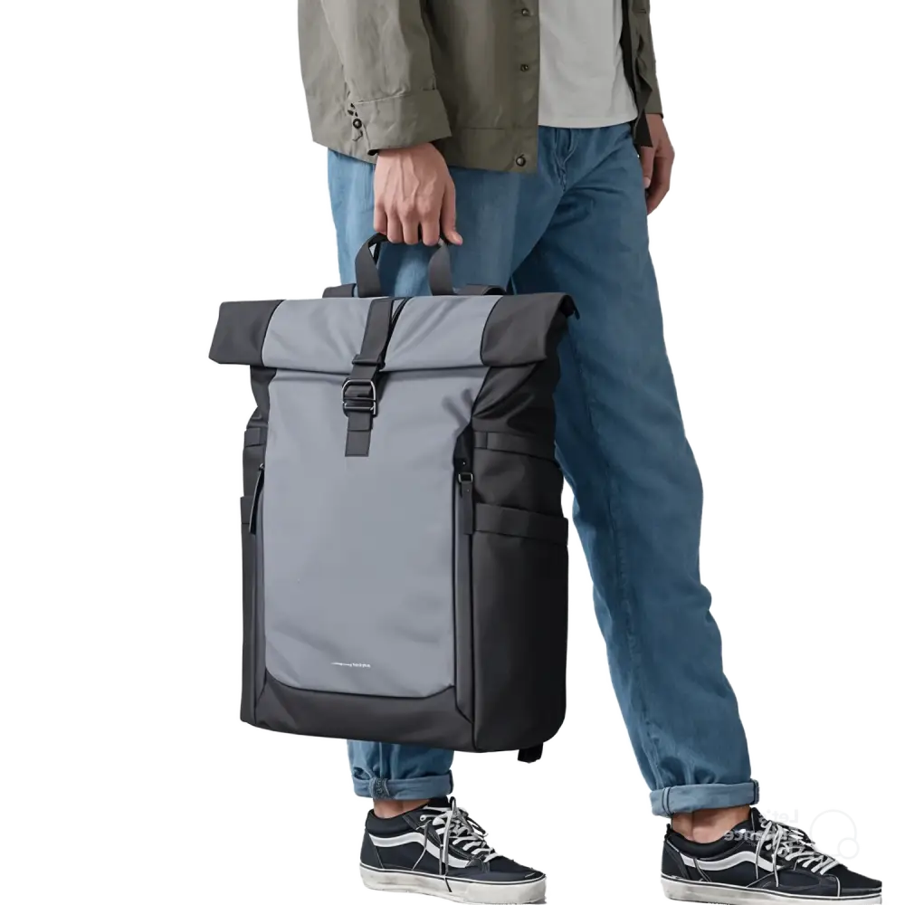 Sac à dos à roulettes gris et noir.