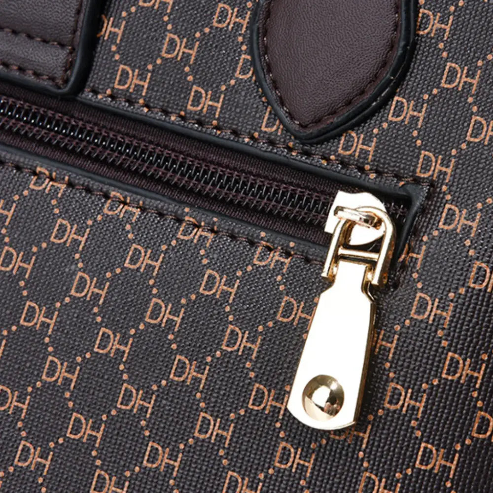 Sac à main classique Alya en brun avec fermeture éclair en or pour un style élégant