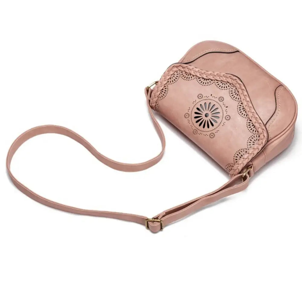 Sac à main cuir vintage rose avec perforations décoratives pour femme élégante