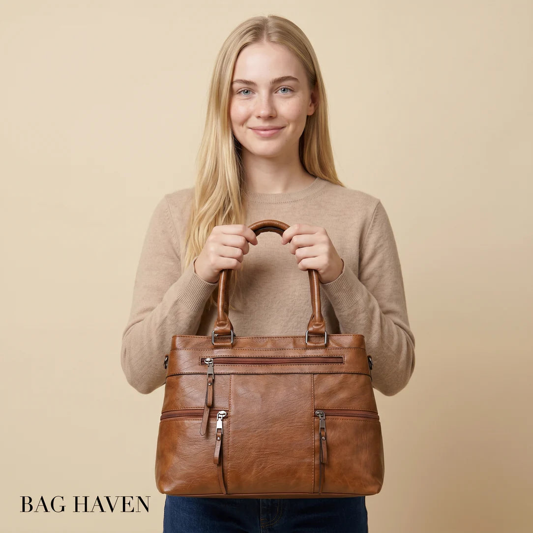 Sac à main de cours satiné vander en cuir marron avec plusieurs compartiments zippés et poignées robustes