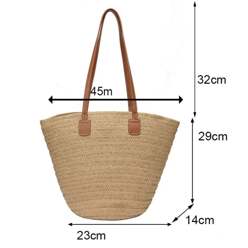 Sac à main en paille avec poignées en cuir marron, parfait pour l’été