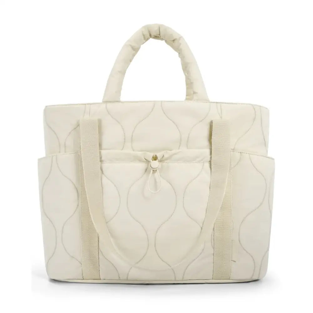 Alt text : Sac à main en tissu matelassé gonflant crème, élégant modèle Bella