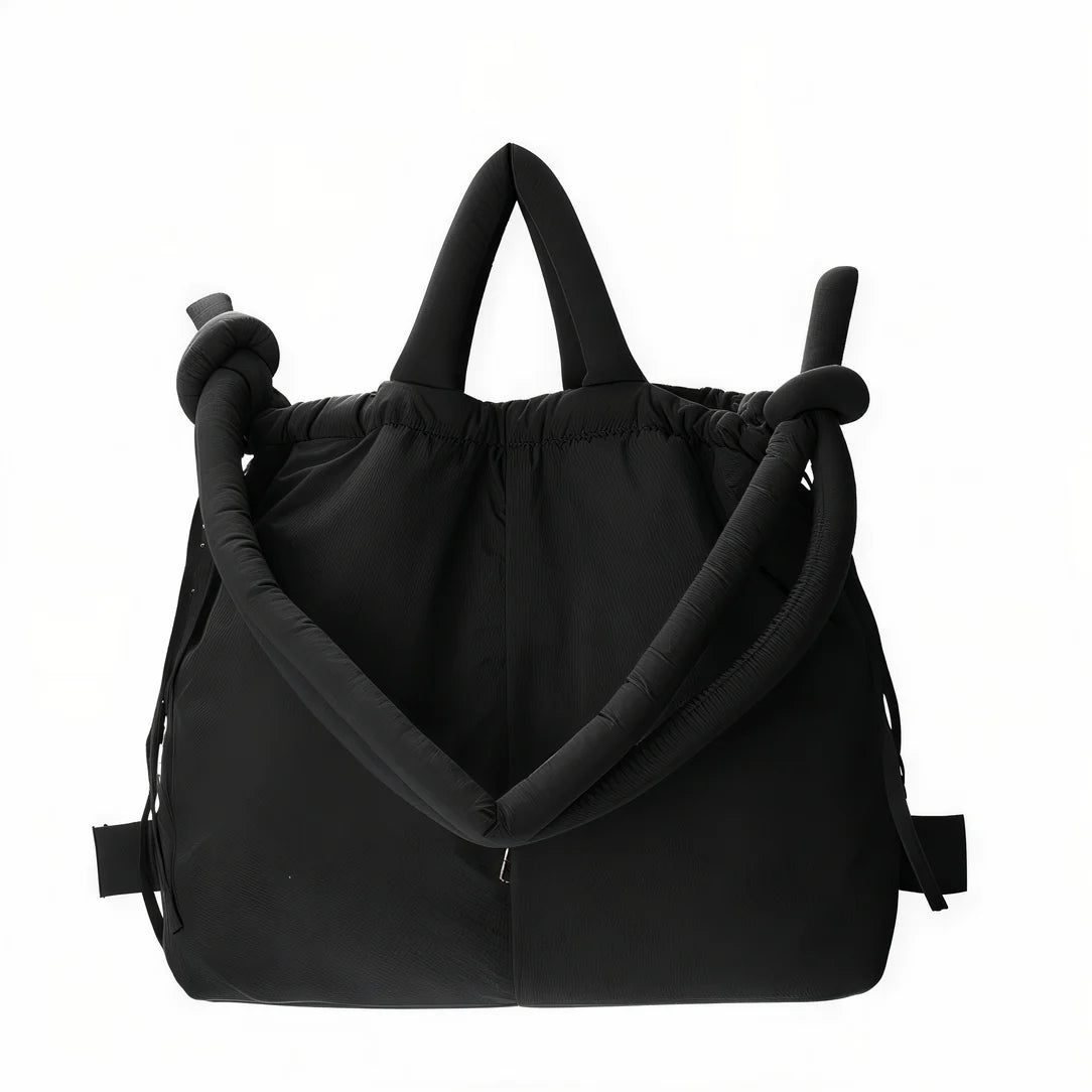 Sac à main modulair noir puffy avec bretelles nouées pour un style tendance