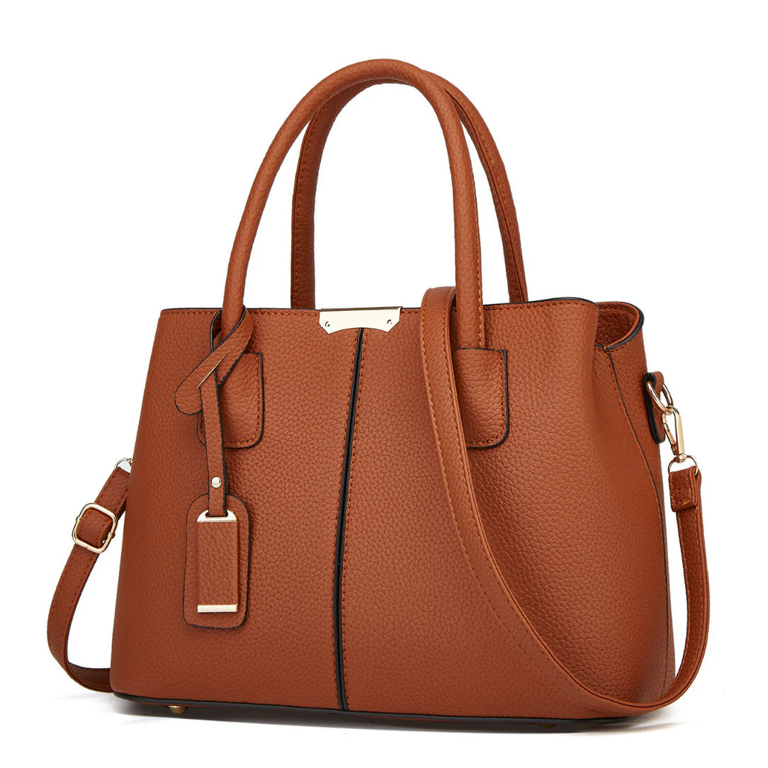 Sac à main minimaliste en effet cuir brun avec bandoulière pour un style sophistiqué