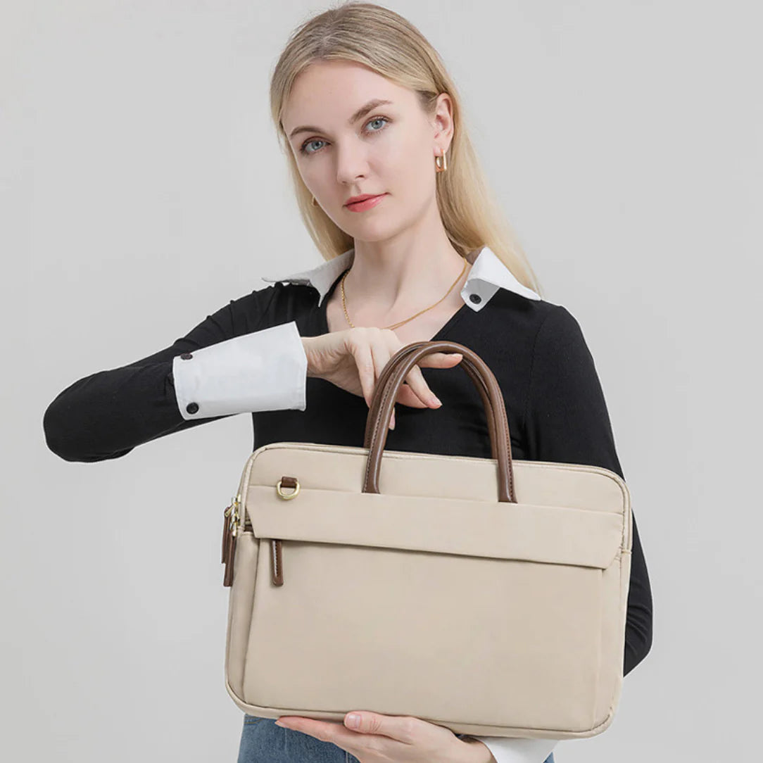 Sac à main ordinateur élégant femme avec finitions cuir beige et poignées brunes