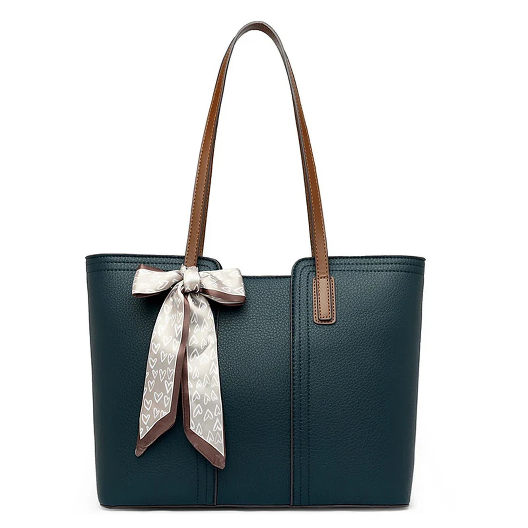 Sac à main porté épaule en cuir texturé avec sac vert foncé, poignées marron et foulard