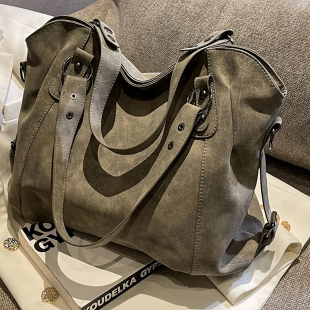 Sac bandoulière Myndra en similicuir souple avec sac gris en daim