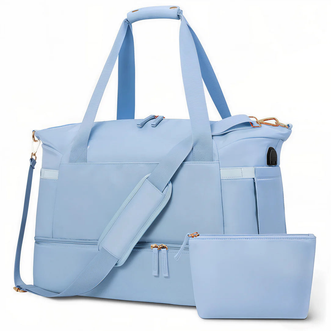 Sac bandoulière femme voyage en bleu clair avec toilette assortie et pochette