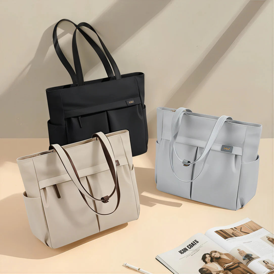 Tote bags en noir beige et gris dans le sac cabas multipoches Vélina