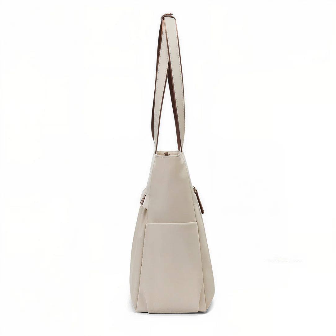 Sac cabas multipoches beige avec bandes brunes, parfait pour toutes vos envies
