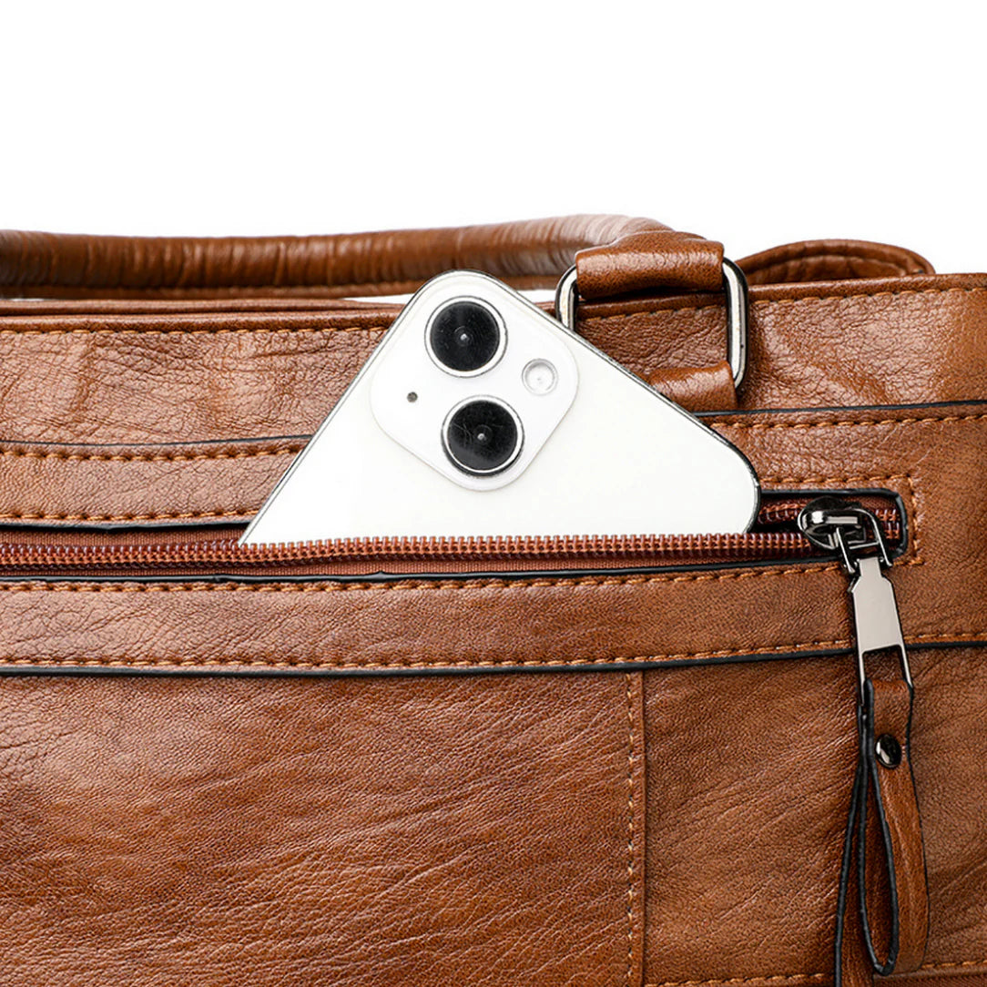 Sac de cour en cuir Vander avec poche pour téléphone blanc et cuir vander élégant