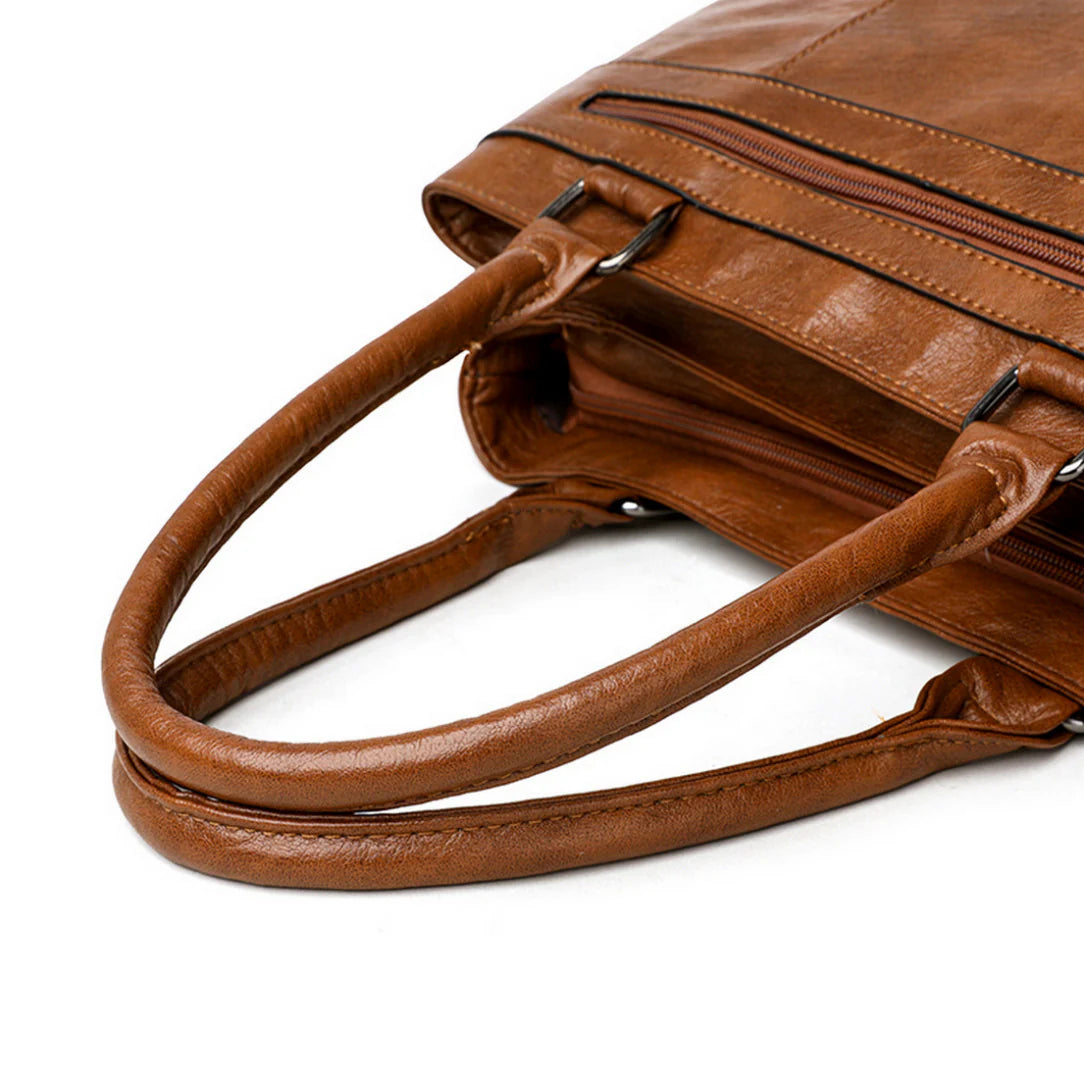 Sac de cour en cuir Vander avec poignées en cuir authentique, style élégant et durable