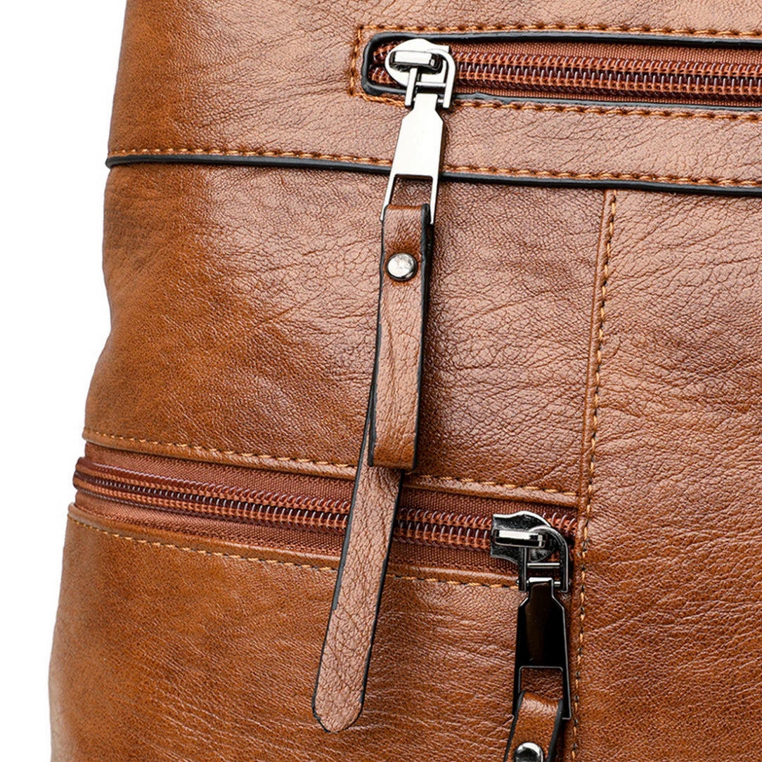 Sac de cour en cuir Vander en simili cuir brun avec zippers pour femme