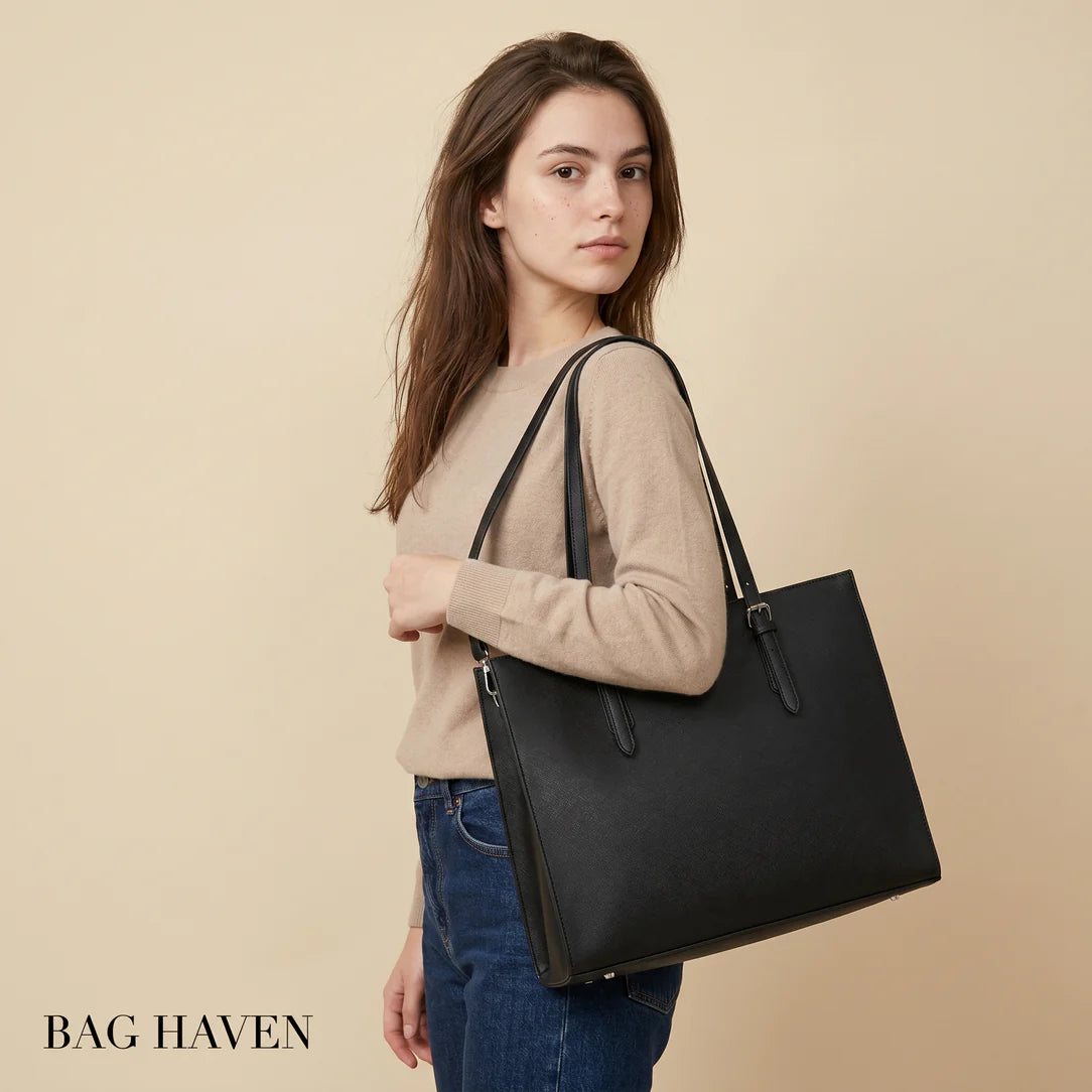 Sac de cour noir tessium en cuir avec bandoulière ajustable et fermeture à rabat avant