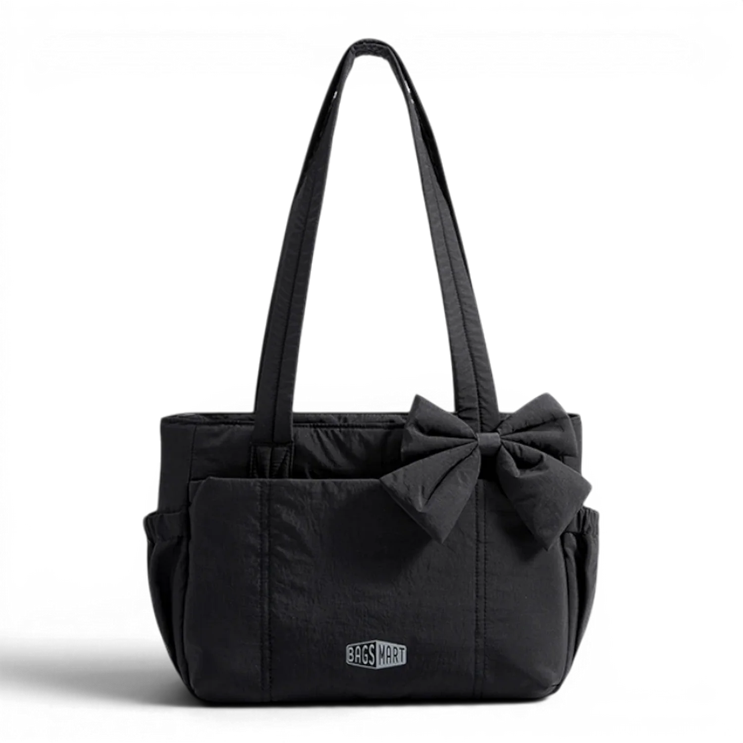 Sac de cours souple noir en matière matelassée avec un grand noeud à l’avant et bandoulières doubles