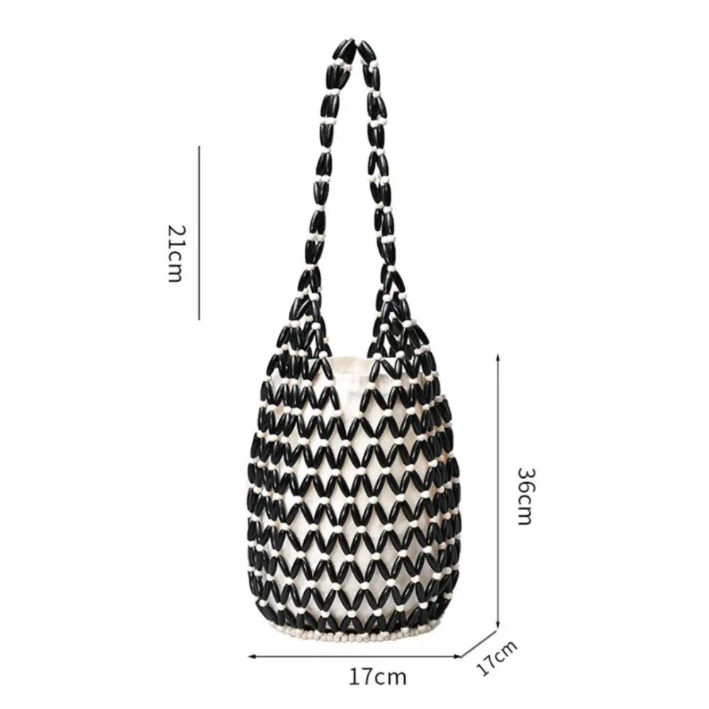 Sac de plage Cala en design aéré noir et blanc, style naturel pour journées d’été