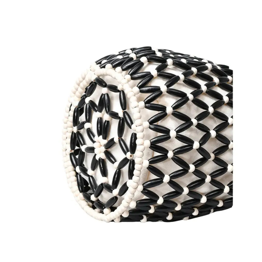 Coussin de siège cylindrique en perles pour un style naturel et design aéré, idéal pour journées d’été