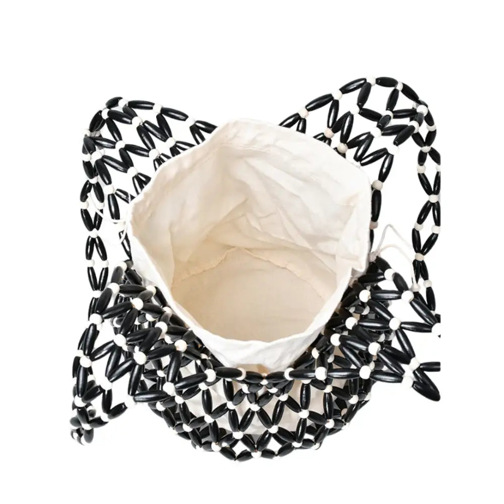 Sac de plage Cala en design aéré, style naturel idéal pour les journées d’été