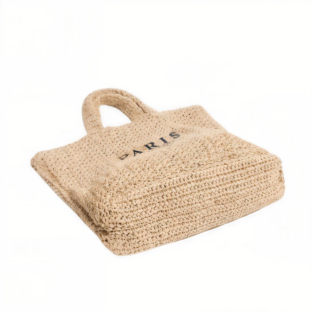 Sac de plage chic Milano en woven beige avec anses courtes pour un style élégant