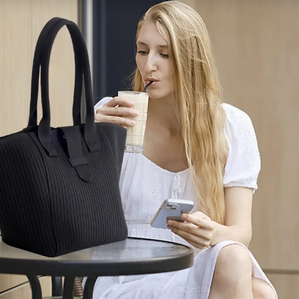 Sac de plage en tissu Brisa avec sac noir à rayures pour crème solaire