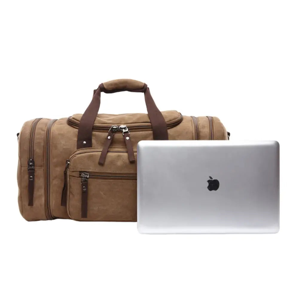 Sac de sport en toile marron avec ordinateur portable.