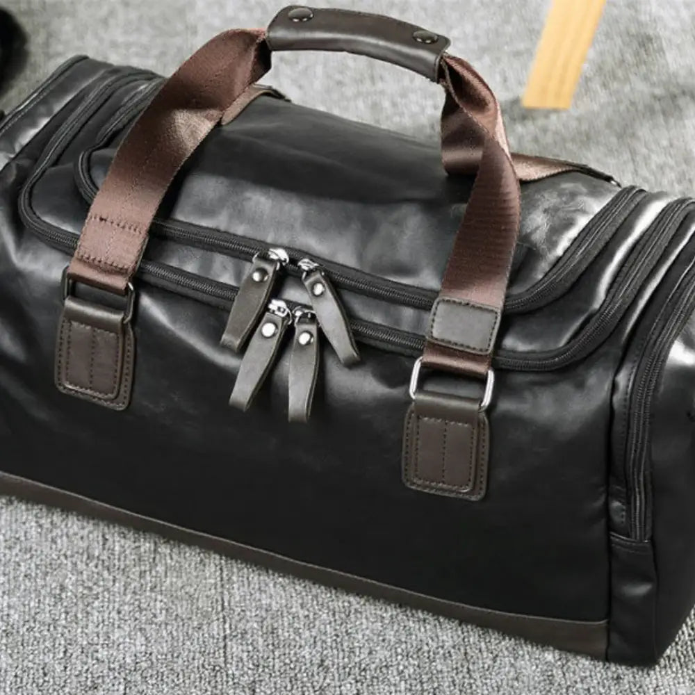 Sac de voyage en cuir vintage OldSmith avec un grand sac en cuir noir