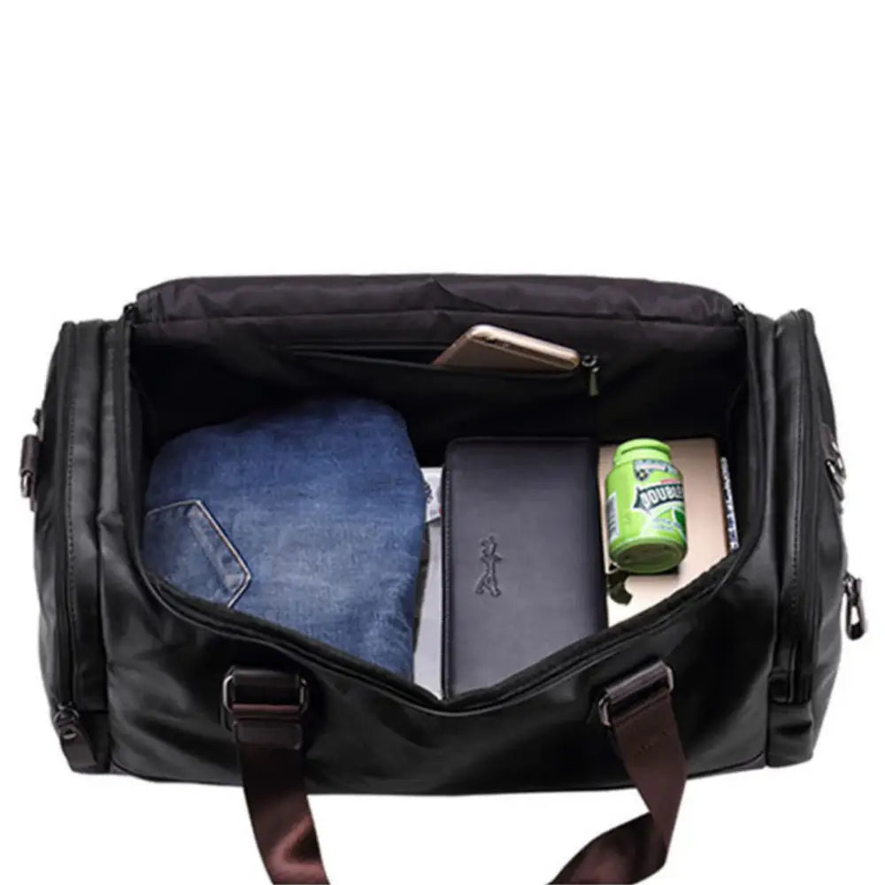 Sac de voyage en cuir vintage OldSmith avec un grand sac en cuir noir ouvert