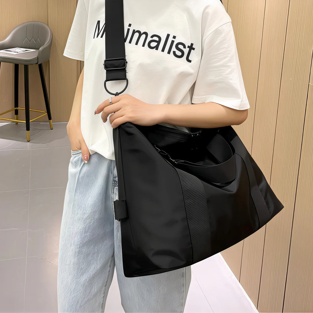 Sac femme noir avec anses larges et bandoulière amovible, sac à main pratique