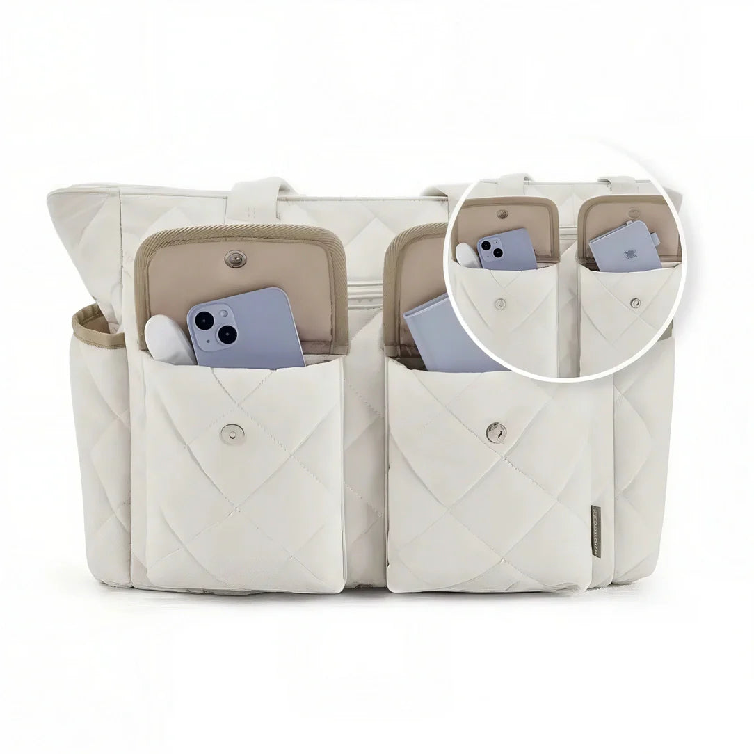 Sac fourre Tilda avec design quilté blanc, format spacieux et poches pour rythmes scolaires