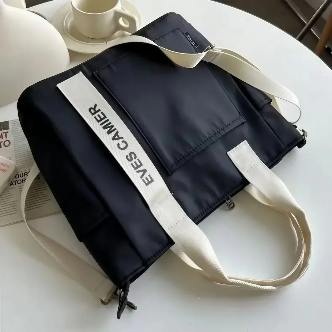 Sacs fourre tout femme noir avec bandes blanches du Camier