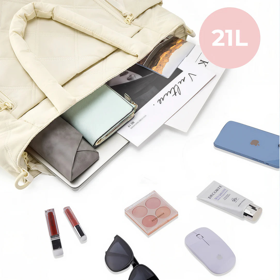 Sac en tissu beige puffy avec accessoires dispersés pour le Grand sac en tissu Miléa