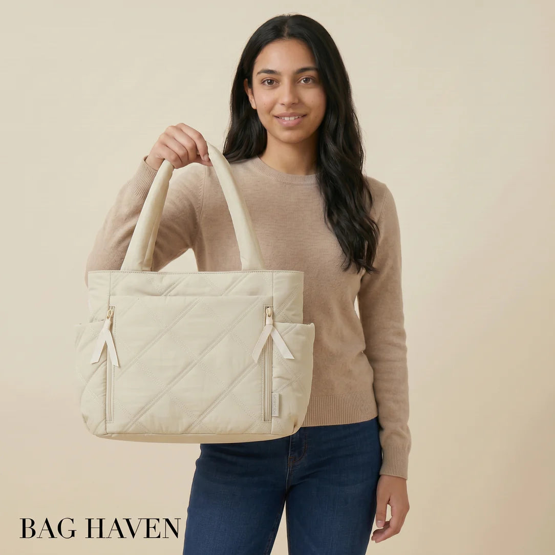 Grand sac en tissu miléa crème matelassé avec poches à fermeture éclair et attaches en tissu