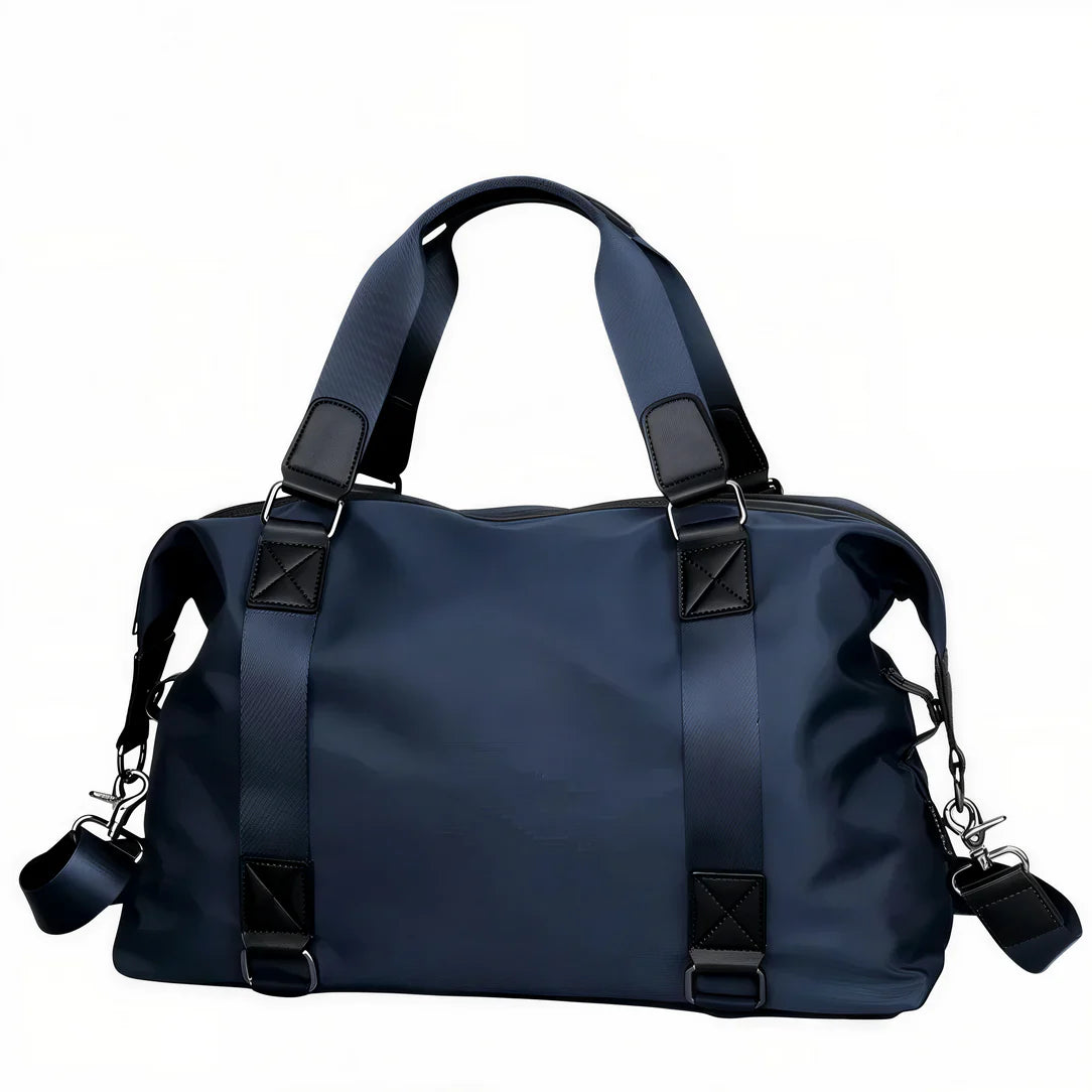Petit sac de voyage Vectra en bleu avec accents noirs, parfait pour courts séjours