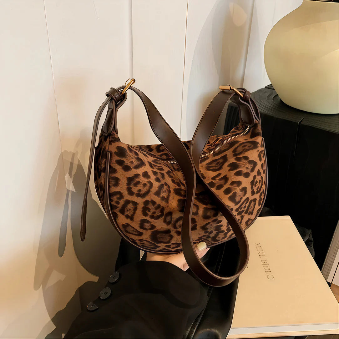 Sac à bandoulière léopard élégant avec format compact et bandoulière léopard