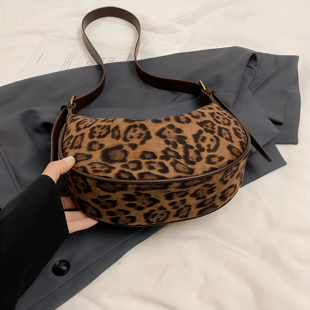 Sac à bandoulière léopard élégant avec format compact et bandoulière léopard